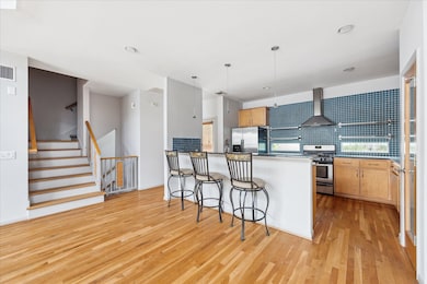 This bright and open second-floor offer living and