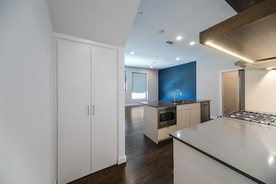 Kitchen on 2nd floor with living room and storage!