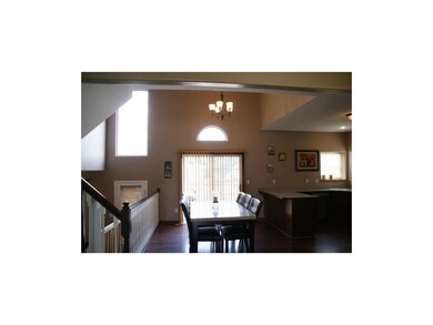 dining area with vaulted ceilings