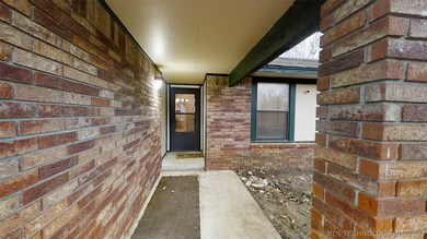Covered walkway leading up to the front door
