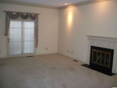 Great Room Boasts Access To Private Patio