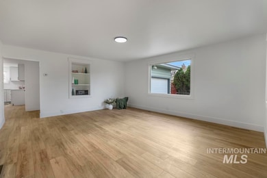 Empty room featuring light wood-style floors