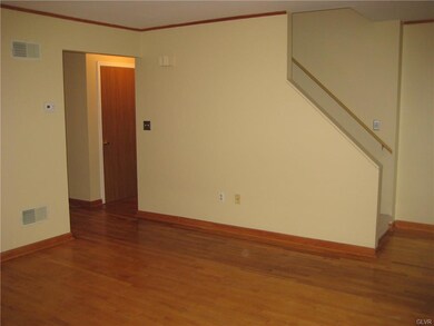 View of stairway to 2nd floor.