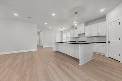 Photos are of a previous build. Floor plan is the