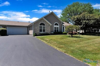 Charming condo with a 2 car attached garage.