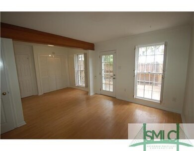Dining Room. Washer/Dryer are behind the folding d