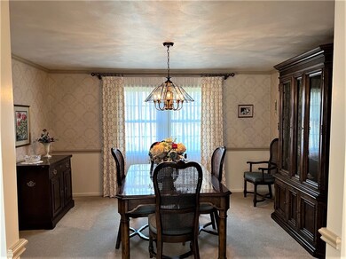 DINING ROOM, NEUTRAL WALL TO WALL, CHAIR RAIL AND