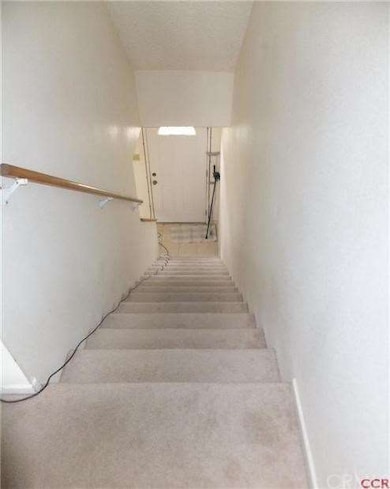 Stairs from common living area of the 1st floor to