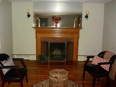 Living Room. Wood working fireplace for those fall