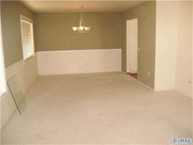 More of the living room and the formal dining room