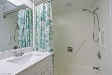 Bathroom featuring shower / bath combo with shower