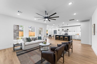 The open floor plan is open and inviting, resting