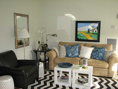 Living Room. Unit is filled with natural light
