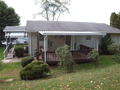 Exterior Back. Private rear covered deck and also 