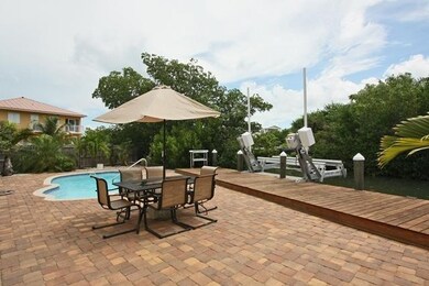 Back yard, paver patio, pool & dock