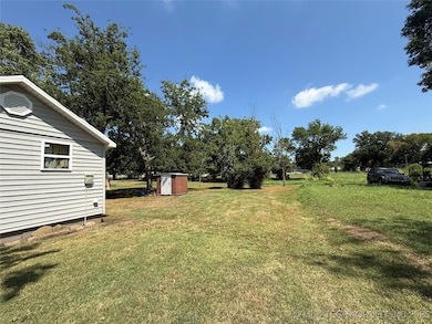 220 E Audd Ave, Checotah, OK 74426 - photo 5