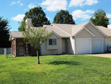Corner lot with 2 car garage and fenced in back ya