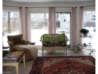Fabulous Sun Room with ceramic tile floor and wall