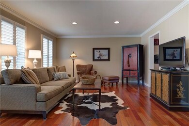 Family room features gorgeous Brazilian cherry har