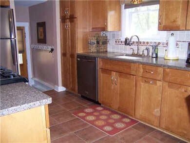 Kitchen. Lots of solid maple cabinets in this comf