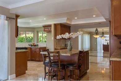 Amazing kitchen with a large island with sitting a
