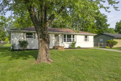 Our renovation turned this home into a 3-bedroom, 2-bathroom beauty (Grass virtually enhanced)
