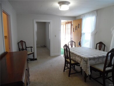 This view show the entrance door to the right, a d