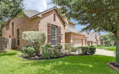View of front of house with brick siding, concret