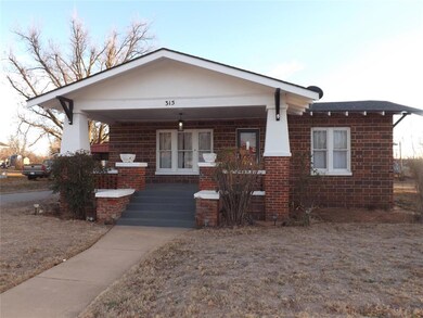 View of front of property featuring covered porch 