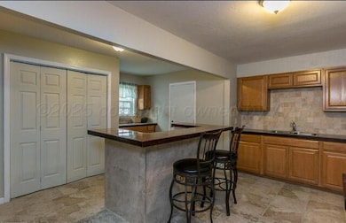 kitchen with laundry closet