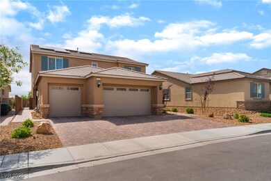 View of front of property featuring stone siding,