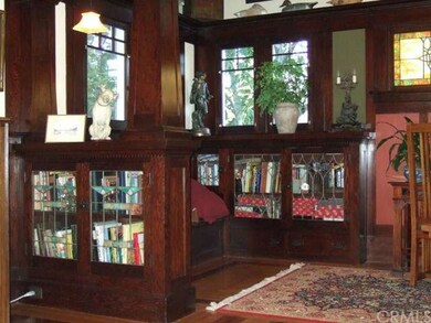 2 of the 4 bookcases in this area with leaded glas