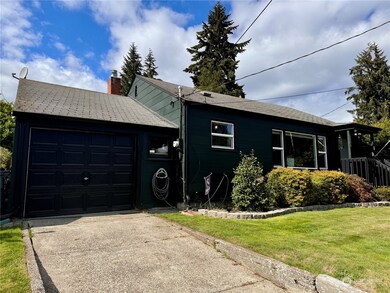 1 car garage that is so deep, there is room for a laundry area and shop space.