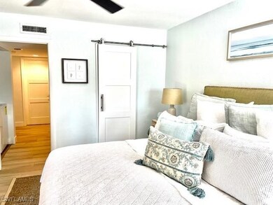 Bedroom featuring visible vents and light wood-style flooring