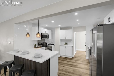 Featuring a breakfast island, new cabinetry, count