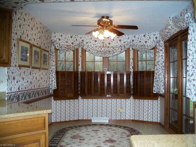 Breakfast nook with ceramic floor , views of woode