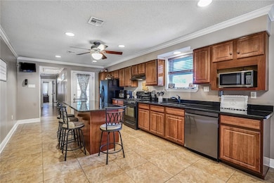 EAT IN KITCHEN WITH LARGE GRANITE ISLAND