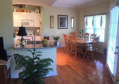 View of the kitchen and dining area from the livin