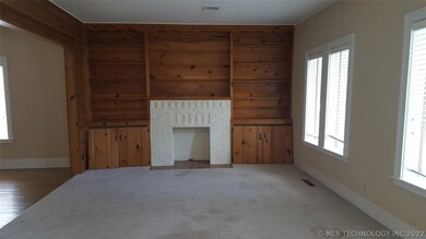 The large living area also enjoys natural light al