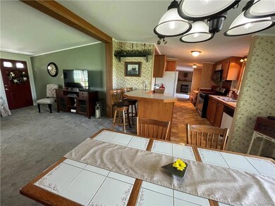 The dining area leads to a small snack bar & a ful