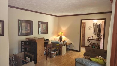 Office space featuring baseboards, ornamental mold