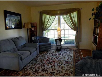 Living Room. The dining room is just a step away f