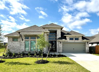 Spacious split three-car garage and long driveway