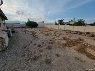 Back yard w Brick/ stucco walls