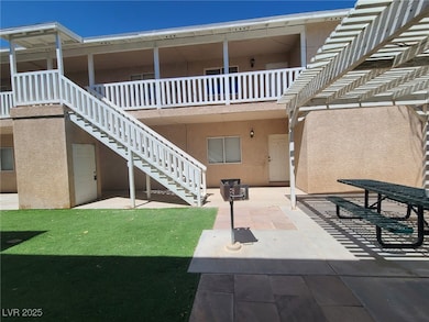 View of property featuring stairway