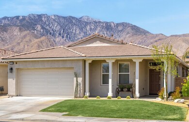 Front of house w/mountains