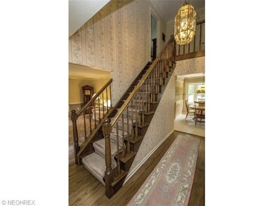 Hardwood Foyer in this solid Center Hall Colonial.