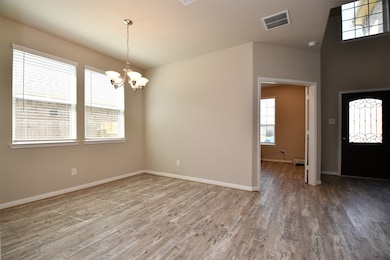 This dining room is bathed in natural
light strea