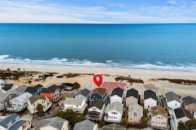 Drone / aerial view featuring a water view and a v