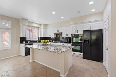 Discover a stylish chef’s kitchen with a granite i